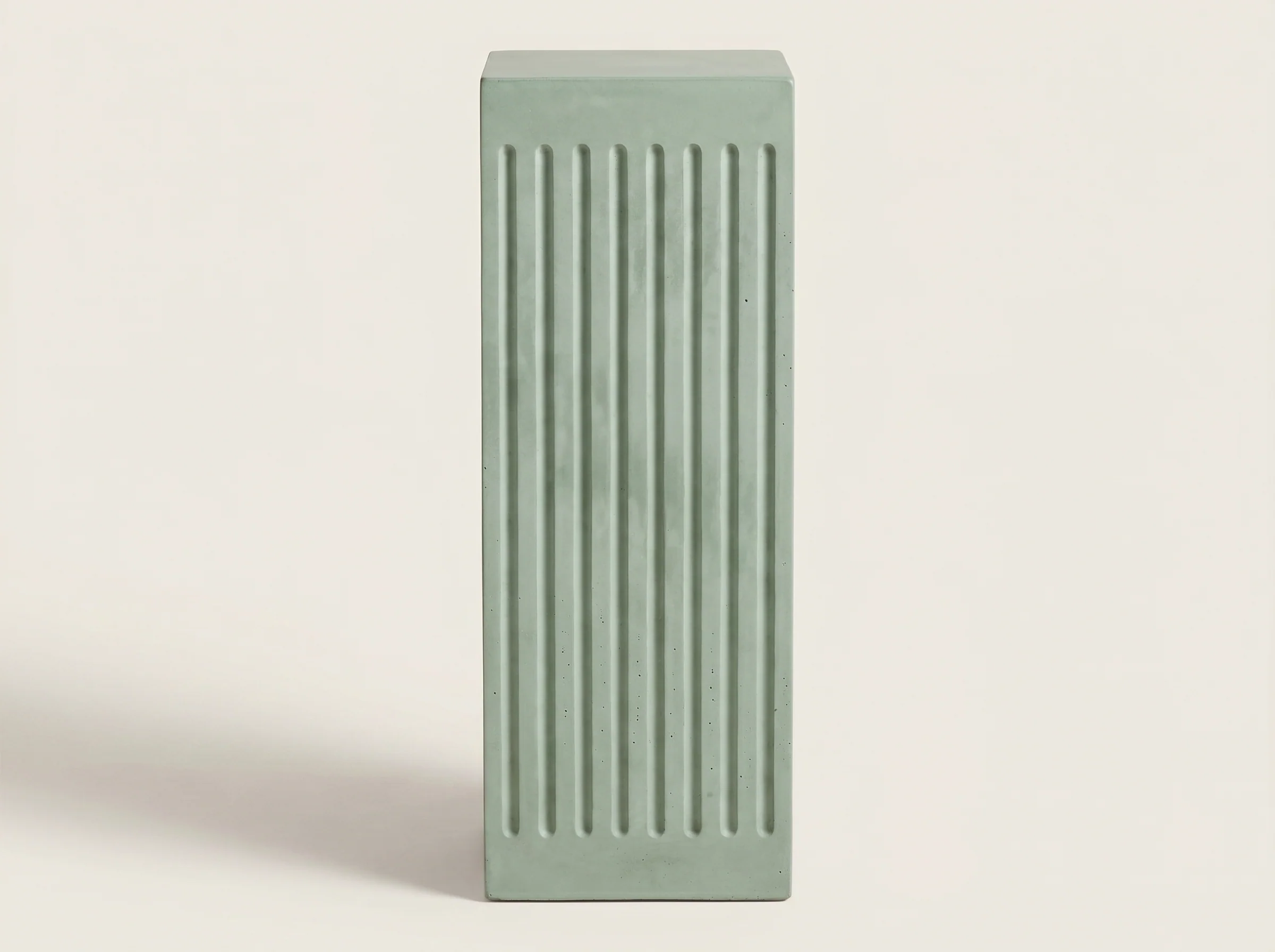 Coronado Fluted Concrete Side Table in Sage Cement, In situ