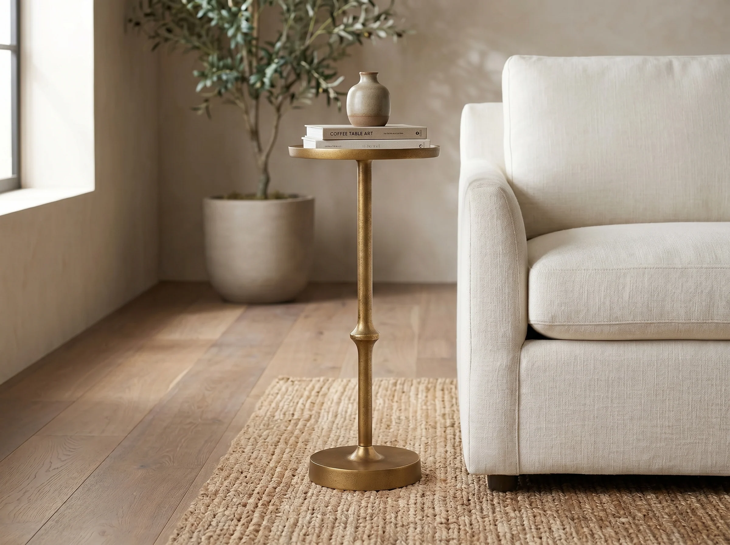 Encinitas Pedestal Side Table in Antique Brass, In situ